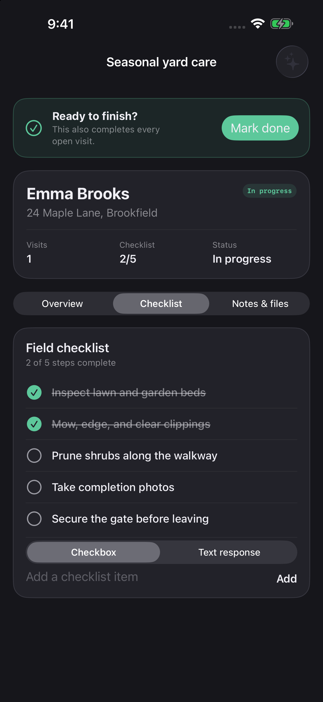 A job's customer details, progress, and field checklist in dark mode