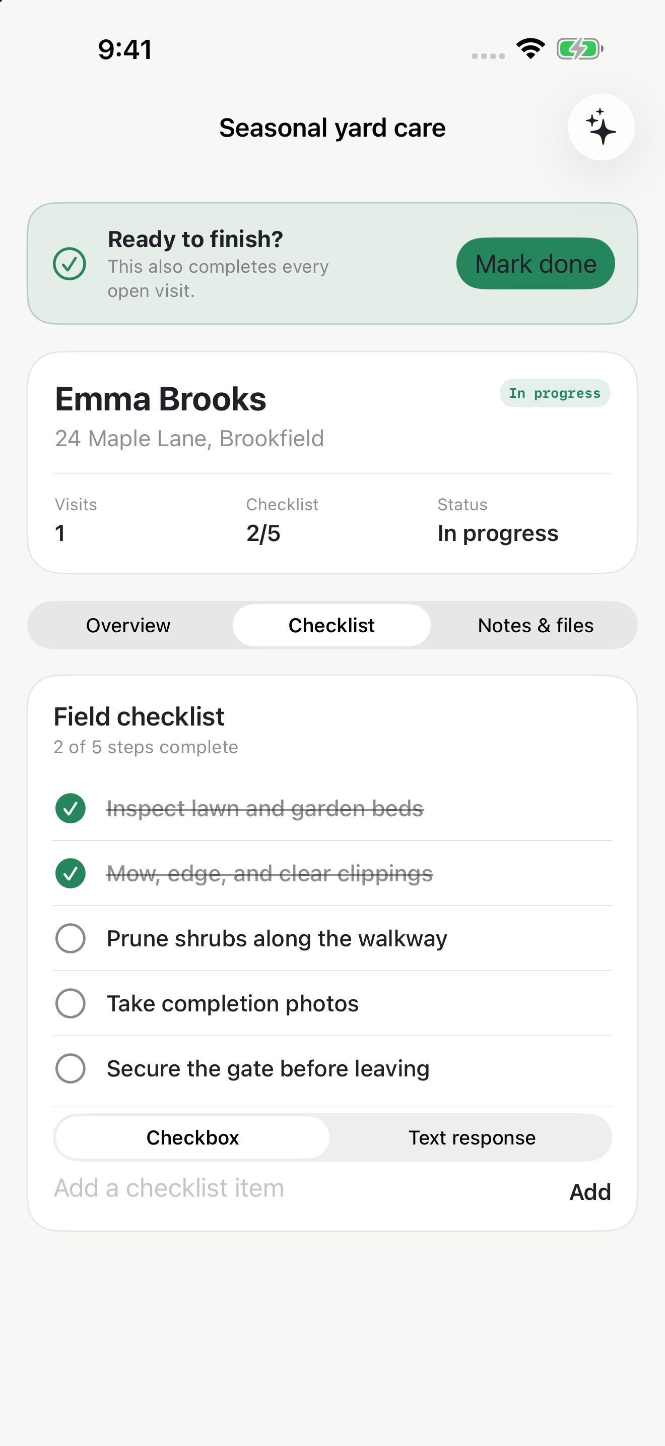A job's customer details, progress, and field checklist in Serviq for iPhone